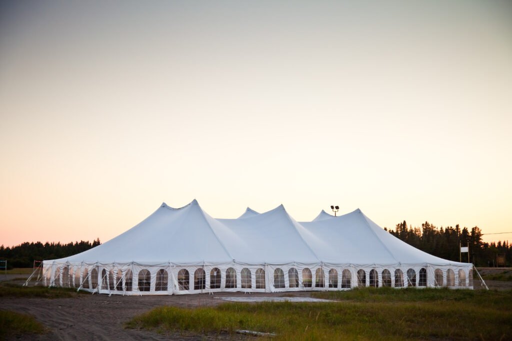 Party or event white tent during the evening